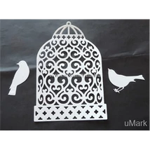 Papírkivágás díszes kalitka madarakkal